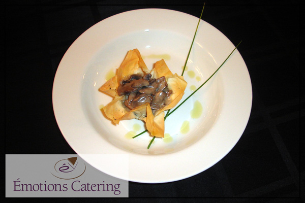 Appetizer - Mushrooms in White Wine Sauce served in a Phyllo Tulip